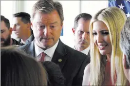  ?? Scott Sonner ?? The Associated Press Sen. Dean Heller, R-nev., and Ivanka Trump, President Donald Trump’s daughter, talk to supporters after their speeches Thursday at the GOP field office in Reno.