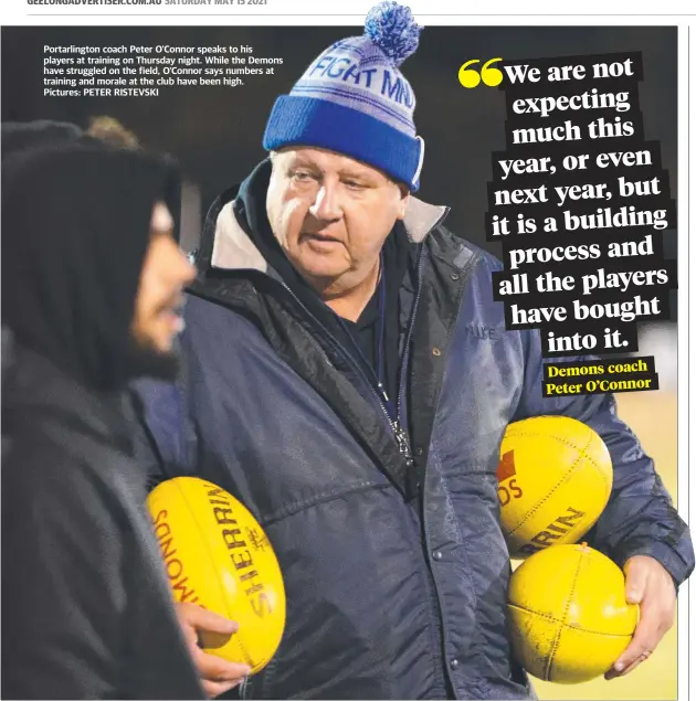  ??  ?? Portarling­ton coach Peter O'Connor speaks to his players at training on Thursday night. While the Demons have struggled on the field, O’Connor says numbers at training and morale at the club have been high.
Pictures: PETER RISTEVSKI