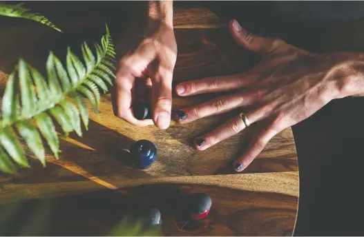  ?? PHOTOS: CAROLYN VAN HOUTEN/THE WASHINGTON POST ?? A handful of male celebritie­s are starting nail polish lines, including chef-author Kwame Onwuachi and rapper Machine Gun Kelly.