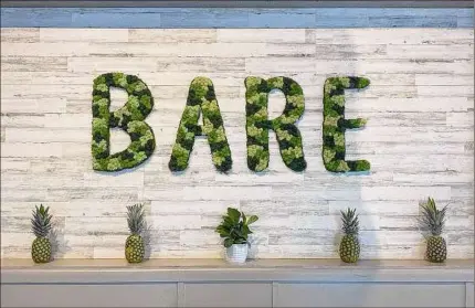  ?? Provided, Gina Butera ?? Bare Blends store sign in Saratoga Springs created with moss by Capital InteriorSc­apes The business will soon expand into a Clifton Park location to continue to serve commercial clients..