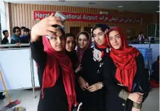  ?? AFP ?? Teenagers from the Afghanista­n Robotic House at the Herat Internatio­nal Airport before leaving for the US