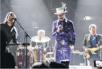  ?? ELEVATION PICTURES ?? The Tragically Hip‚ led by singer Gord Downie, in a scene from Long Time Running, a new documentar­y by Jennifer Baichwal and Nicholas De Pencier.