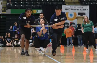  ?? Photos by Logan Hebel ?? WRIST CARRY— Wookie Nichols toughens it out in the Wrist Carry event during last week’s NYO Games in Anchorage.