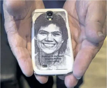  ?? ANDREW VAUGHAN/ THE CANADIAN PRESS ?? Robert Pictou, father of Virginia Pictou, displays a phone cover with a photo of his daughter as he attends the National Inquiry into Missing and Murdered Indigenous Women and Girls, in Membertou, N. S. on Tuesday. The family of a Mi’kmaq woman who...