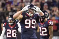  ?? Eric Christian Smith / Associated Press ?? Houston Texans defensive end J.J. Watt celebrates during the second half of a 2020 NFL wild-card playoff game against the Buffalo Bills in Houston. Watt has agreed to a two-year contract with the Arizona Cardinals.