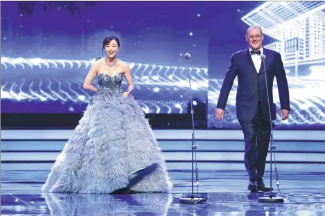  ?? PHOTOS PROVIDED TO CHINA DAILY ?? Chinese actress Zhang Jingchu and French actor Jean Reno attend the opening ceremony of the 20th Shanghai Internatio­nal Film Festival, which runs through Monday.