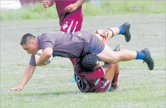  ??  ?? The Te Hiku o te Ika Mavericks (in grey) flattened all comers on way to claiming the 2018 Taitokerau Rugby League title.