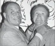  ?? AP PHOTO/ LENNOX MCLENDON, FILE ?? In this 1977 file photo, comedian Don Rickles, left, pretends to strangle fellow comedian Red Buttons prior to an Annual Stag Roast in Los Angeles. Rickles died Thursday of kidney failure at his Los Angeles home. He was 90.