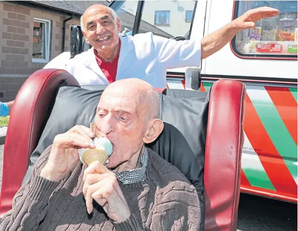  ??  ?? Primo Cabrelli enjoys a birthday cone from his old pal Frankie, of Frankie’s Ice Cream, who came to see him at Forebank Care Home.