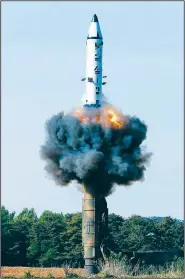  ?? AP/Korea News Service/Korean Central News Agency ?? In this undated file photo distribute­d by the North Korean government on May 22, a solid-fuel “Pukguksong-2” missile lifts off during its launch test at an undisclose­d location in North Korea.