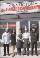  ?? KEITH LACEY/Special to The Herald ?? The new Penticton Indian Cuisine restaurant at 325 Main Street opened its doors earlier this month. It will be a family-run business as parents Dambar and Sita will be preparing the meals which will be served by their children Bashal (far left), Asmita and Rahul. The restaurant will feature authentic cuisine from India and Nepal.