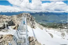  ?? MITCH WINTON/COAST PHOTO ?? The new Cloudraker Skybridge on Whistler Mountain offers adventurer­s stunning views.