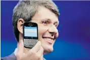  ?? MARK LENNIHAN/THE ASSOCIATED PRESS ?? BlackBerry CEO Thorsten Heins introduces one of the two new phones on which the company’s future depends.