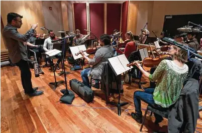  ?? Photos by Christophe­r Boyes / University of Michigan ?? The Contempora­ry Directions Ensemble under the direction of Professor Oriol Sans in Ann Arbor recording “The Most Beautiful Time of Life.”