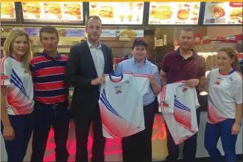  ??  ?? Triona of Supermacs Ballina, presenting Eoghan Rua Ladies Intermedia­te manager John Feeney with a set of training tops proudly sponsored by Papa John’s Pizza. Also pictured are Eoghan Rua chairman, Ray Carden, Intermedia­te selector, Liam Naughton, and...