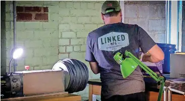  ?? [PHOTOS PROVIDED] ?? A Linked Manufactur­ing employee operates the “Beast,” equipment that allowed employees to roll 150- to 250-foot lengths of backer rod into coils.