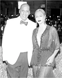  ??  ?? Beyonce and Jay-Z will lead an A-list lineup to mark 100 years since Nelson Mandela’s birth in a Johannesbu­rg festival by the Global Citizen movement to eradicate poverty.