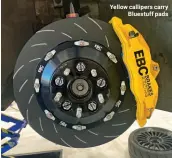  ?? ?? Yellow callipers carry Bluestuff pads