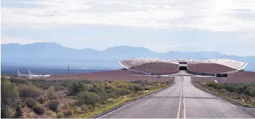  ?? ADOLPHE PIERRE-LOUIS/JOURNAL ?? Virgin Galactic Mothership VMS Eve is parked on the runway of Spaceport America in Upham, N.M., on Aug. 15, 2019.