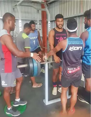  ?? session. ?? Fijian Prime Minister’s XIII centre Pio Seci with team-mates during their gym