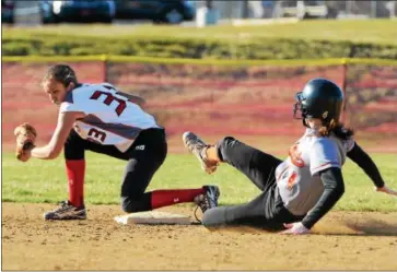  ?? SAM STEWART - DIGITAL FIRST MEDIA ?? Perkiomen Valley’s Sela Fusco slides into second but is tagged out by Boyertown’s Veronica Maryanski after delivering the eventual game-winning hit in the sixth inning.