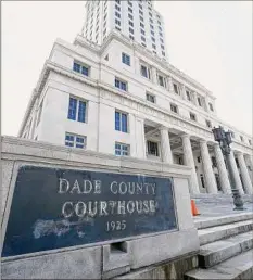  ?? Wilfredo Lee / Associated Press ?? The Miami-dade County Courthouse will begin undergoing repairs immediatel­y after a review found safety concerns.