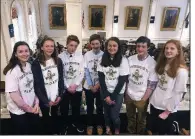  ?? AP/HOLLY RAMER ?? These eighth-graders from Hampton Falls, N.H., were on hand Wednesday to watch the New Hampshire House of Representa­tives vote 333-11 to adopt a bill they drafted designatin­g the red-tailed hawk as the state’s official raptor.