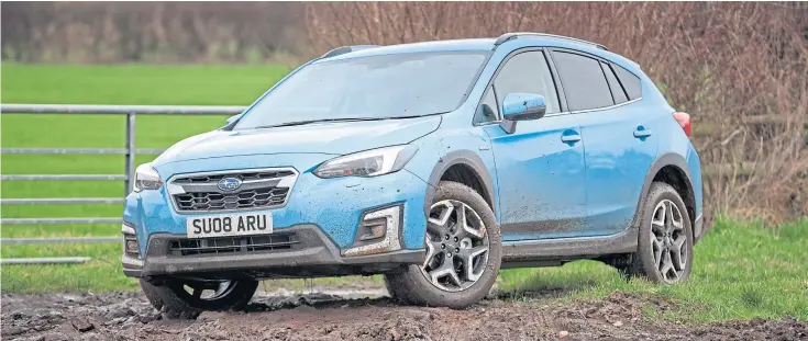  ?? ?? Subaru XV is a car for all seasons, including the worst a Scottish winter can throw at you. The four-wheel drive is still ahead off-road, and handles nicely as it goes quietly about its business.