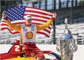  ?? James Gilbert/Getty Images ?? Josef Newgarden, driver of the No. 2 PPG Team Penske Chevrolet, poses for a photo during the 107th Indianapol­is 500 champion’s portraits at Indianapol­is Motor Speedway on Sunday in Indianapol­is.