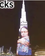  ??  ?? The Burj Khalifa in Dubai was lit up with the image of New Zealand Prime Minister Jacinda Ardern in a black hijab hugging a mourning woman on Sunday. Photo courtesy of Twitter.