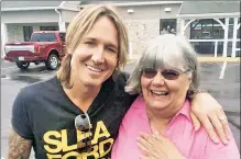  ??  ?? HEY, WHO’S THAT WITH RUTH? Ruth Reed was shocked to learn the man she offered to buy coffee was Keith Urban.