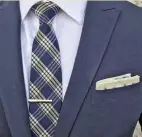  ?? ?? THE CLASSIC TIE: A strong candidate for the ultimate work tie