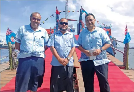  ?? Photo: Laiseana Nasiga. ?? From left: Gold Rock Investment­s Limited chief executive officer Joseva Gavoka, Captain Joseph Albert and Chief commercial officer Maurice Erasito after the commission­ing of the company’s new tug and barge. Behind them is the 7,800 tonne barge.