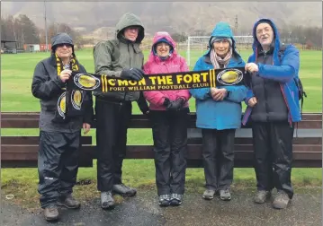  ??  ?? Some of the group at Claggan Park, the home of Fort William Football Club.