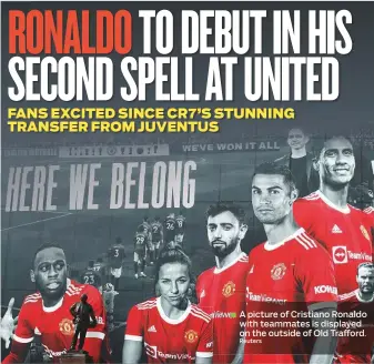  ?? Reuters ?? A picture of Cristiano Ronaldo with teammates is displayed on the outside of Old Trafford.