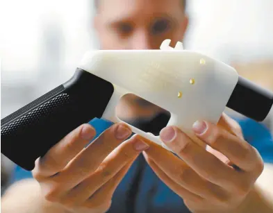  ??  ?? A 3D-printed handgun.