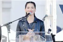  ??  ?? Olivia Munn speaks during the Women’s March in Los Angeles. (AFP)