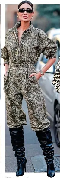  ?? ?? Alice Abdel Aziz wears a khaki and beige snake print jumpsuit