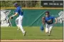  ?? BARRY BOOHER — FOR THE NEWS-HERALD ?? NDCL rallied for an 11-9win at Lake Catholic on May 10.