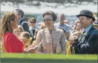  ??  ?? ALL SMILES: The Princess Royal with Artist Emma Stothard, who designed the Craven Heifer sculpture, with show director Charles Mills.