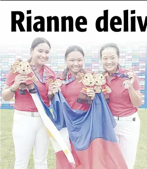  ?? PHOTOGRAPH COURTESY OF NGAP ?? MAFY Singson, Rianne Mikhaela Malixi and Lois Kaye Go show off the bronze medals they won in the 31st Southeast Asian Games in Vietnam.