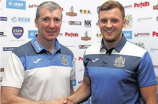  ??  ?? ●●Jim Gannon welcomes Josh Amis back to Edgeley Park