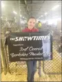  ??  ?? Farmington FFA member Shelby Earnheart received the 3rd place overall award for her Yorkshire Market Hog at the 2020 Arkansas State Fair in Little Rock.