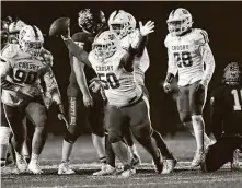  ?? Jason Fochtman / Staff photograph­er ?? Crosby defensive lineman Kaden Jones (50) reacts after recovering a fumble by Liberty Hill quarterbac­k Andon Thomas.