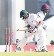  ?? PHOTO BY WICB MEDIA/RANDY BROOKS ?? Pakistan’s Mohammad Abbas is stumped by Shane Dowrich during the second day of the third and final Test of the Brighto Paints Q Mobile Series between West Indies and Pakistan at Windsor Park, Roseau, Dominica yesterday.