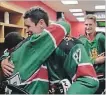  ?? HOLMYARD, BRAYDON TIM HORTONS ?? Sidney Crosby is hugged by a player from Kenya as Nathan MacKinnon watches in a new promotiona­l ad.