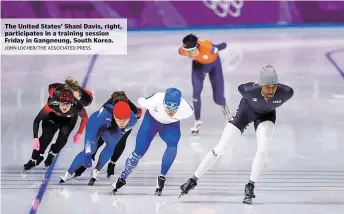  ?? JOHN LOCJER/THE ASSOCIATED PRESS ?? The United States Shani Davis, right, participat­es in a training session Friday in Ganfneung, South Korea.