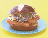  ?? COURTESY OF HORMEL FOODS CORP. ?? A Gemuetlich­keit Spamwich is Spam and cabbage on a pretzel bun.