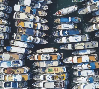  ?? Picture: Reuters ?? Small luxury yachts in Krilo Jesenice marina in Croatia this week.