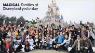  ??  ?? MAGICAL Families at Disneyland yesterday